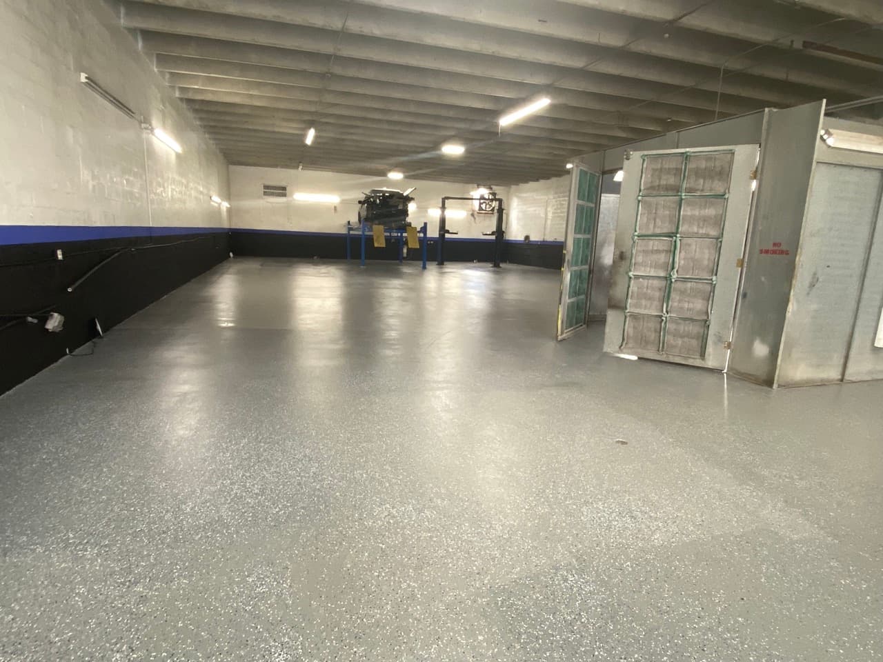 Three in One Auto Body Care shop exterior